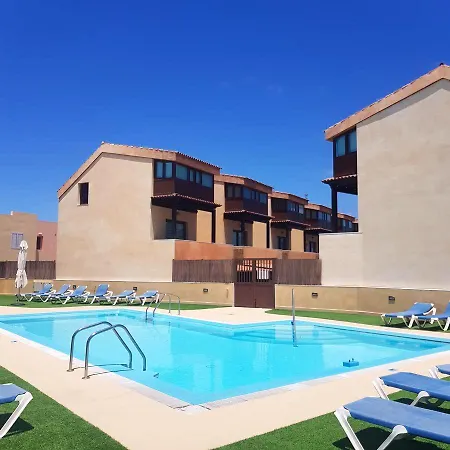 2 Bedrooms House With Sea View Shared Pool And Furnished Terrace At Corralejo La Oliva
