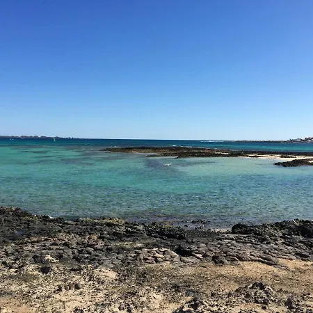 2 Bedrooms House With Sea View Shared Pool And Furnished Terrace At Corralejo *