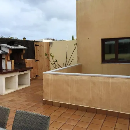 Сasa de vacaciones 2 Bedrooms House With Sea View Shared Pool And Furnished Terrace At Corralejo *